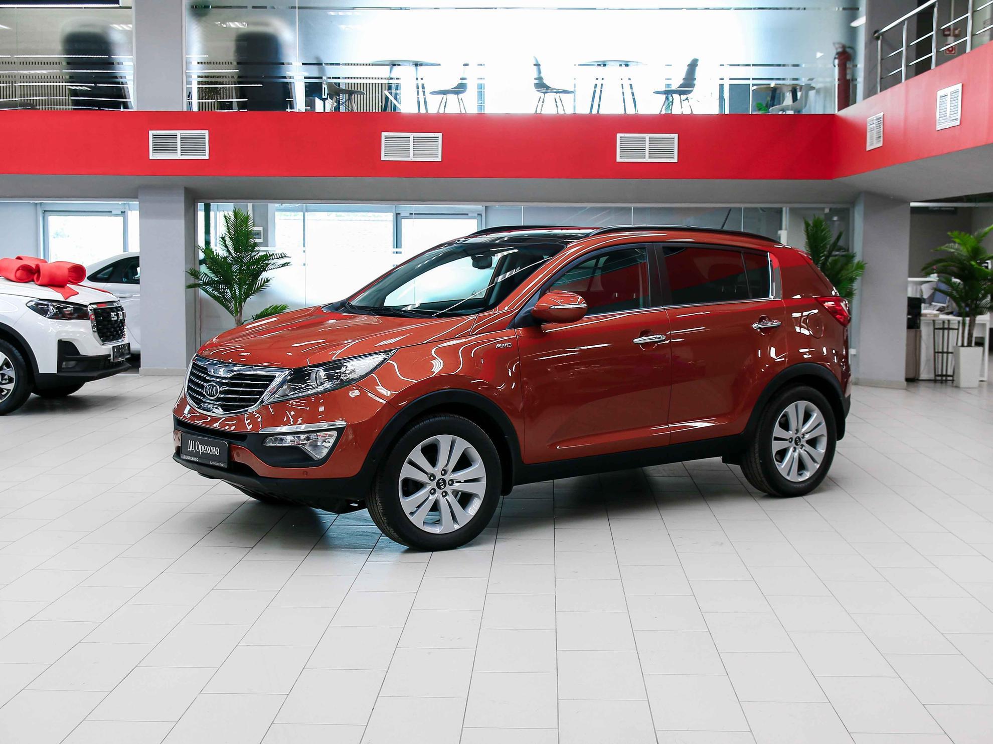 Kia Sportage 2012, оранжевый, ДЦ Орехово
