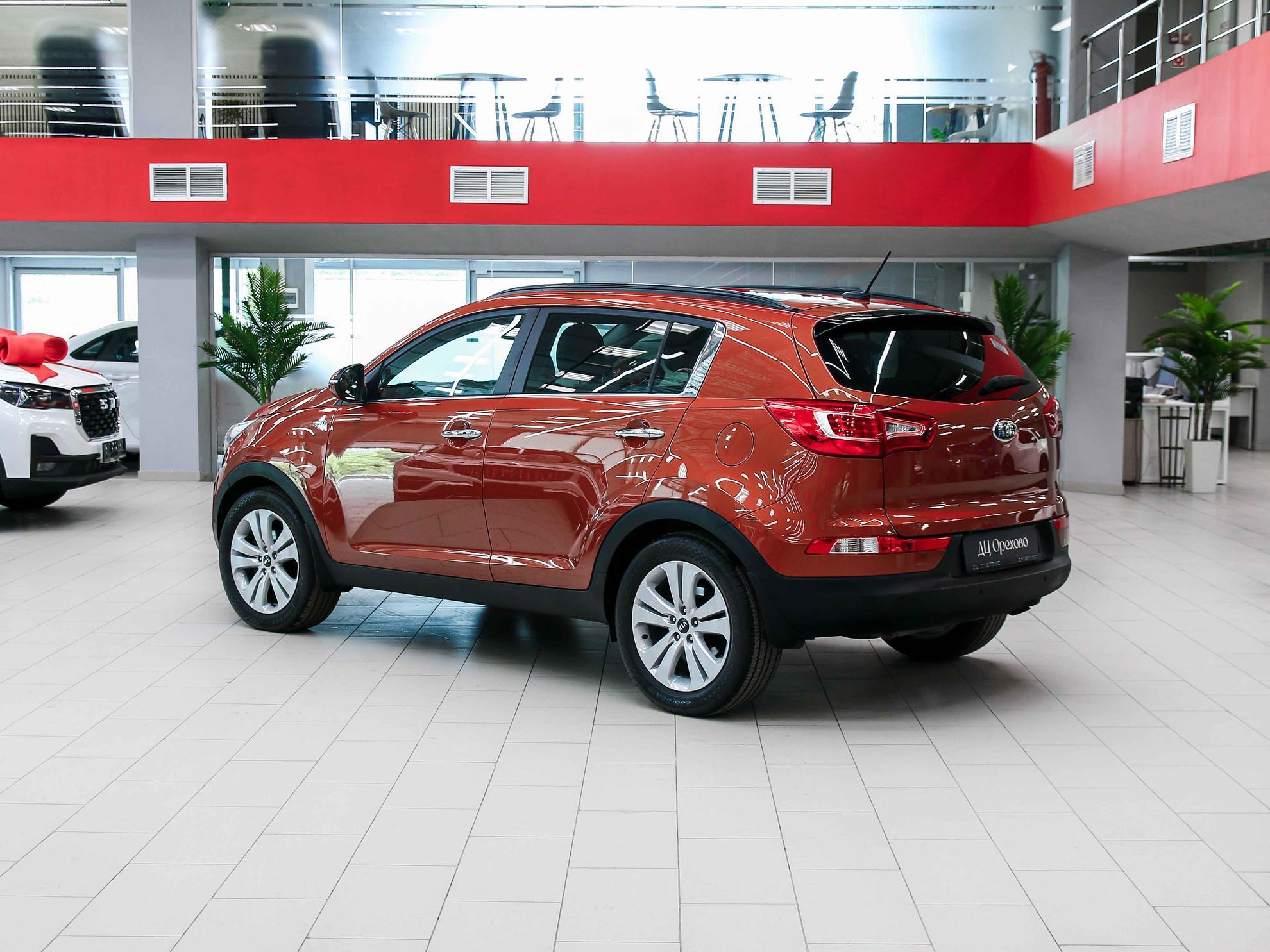 Kia Sportage 2012, оранжевый, ДЦ Орехово
