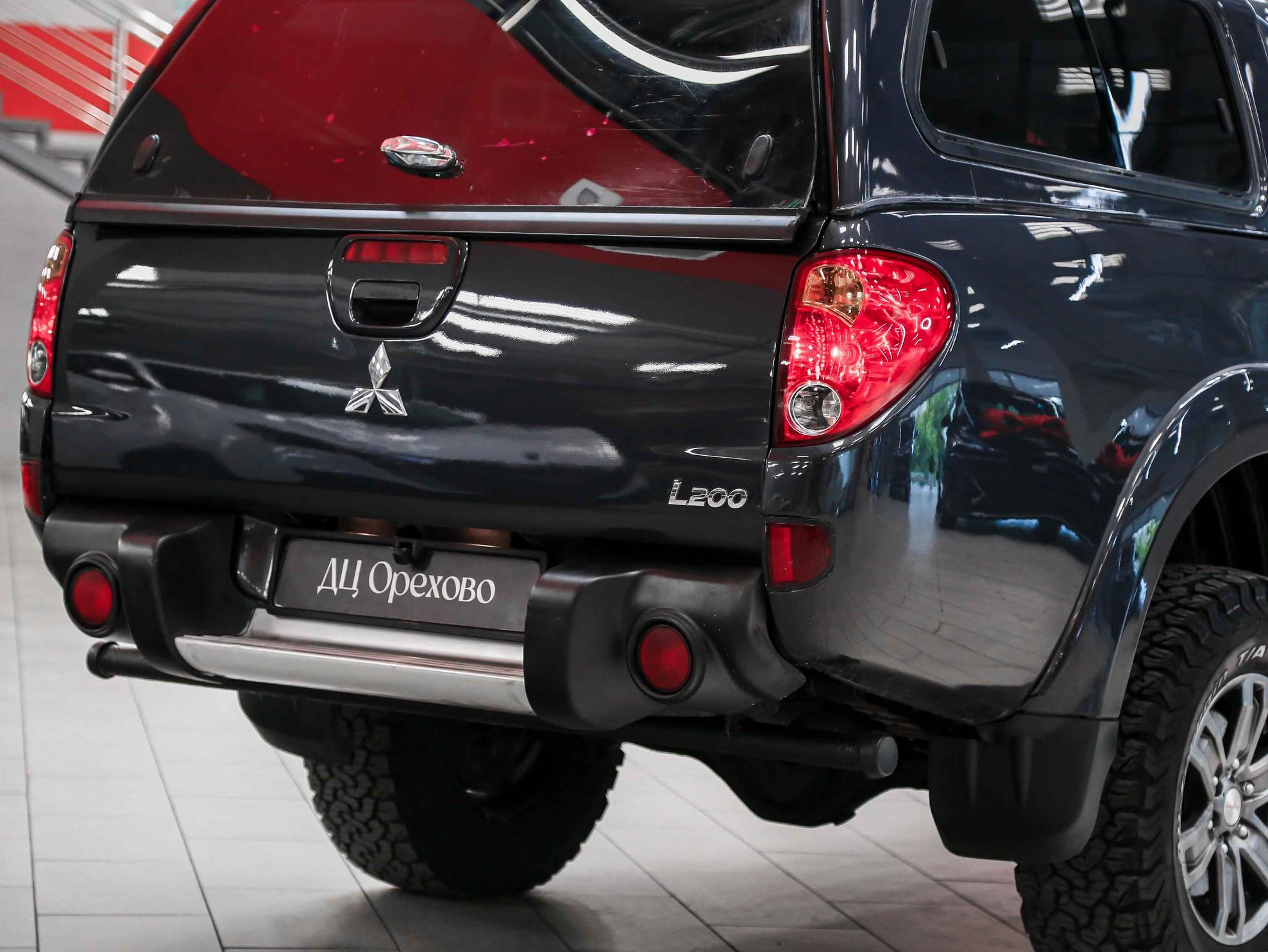 Mitsubishi L200 2011, черный, ДЦ Орехово
