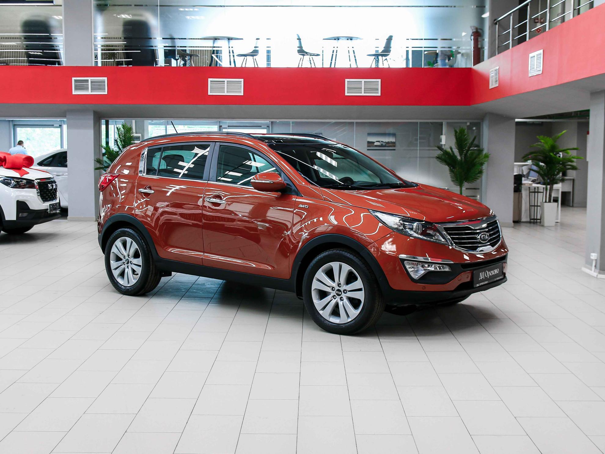 Kia Sportage 2012, оранжевый, ДЦ Орехово
