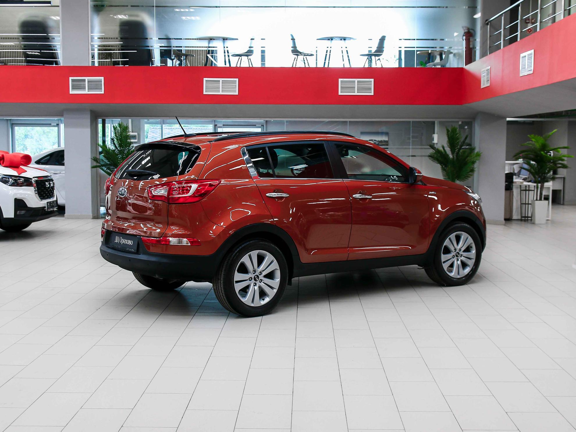 Kia Sportage 2012, оранжевый, ДЦ Орехово