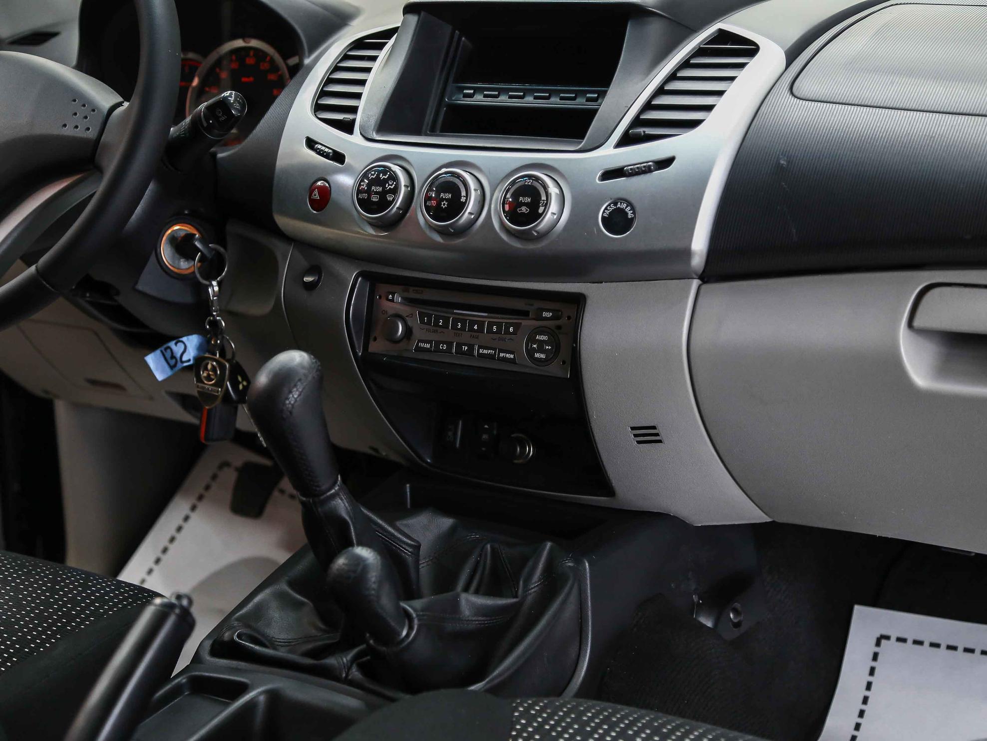 Mitsubishi L200 2011, черный, ДЦ Орехово