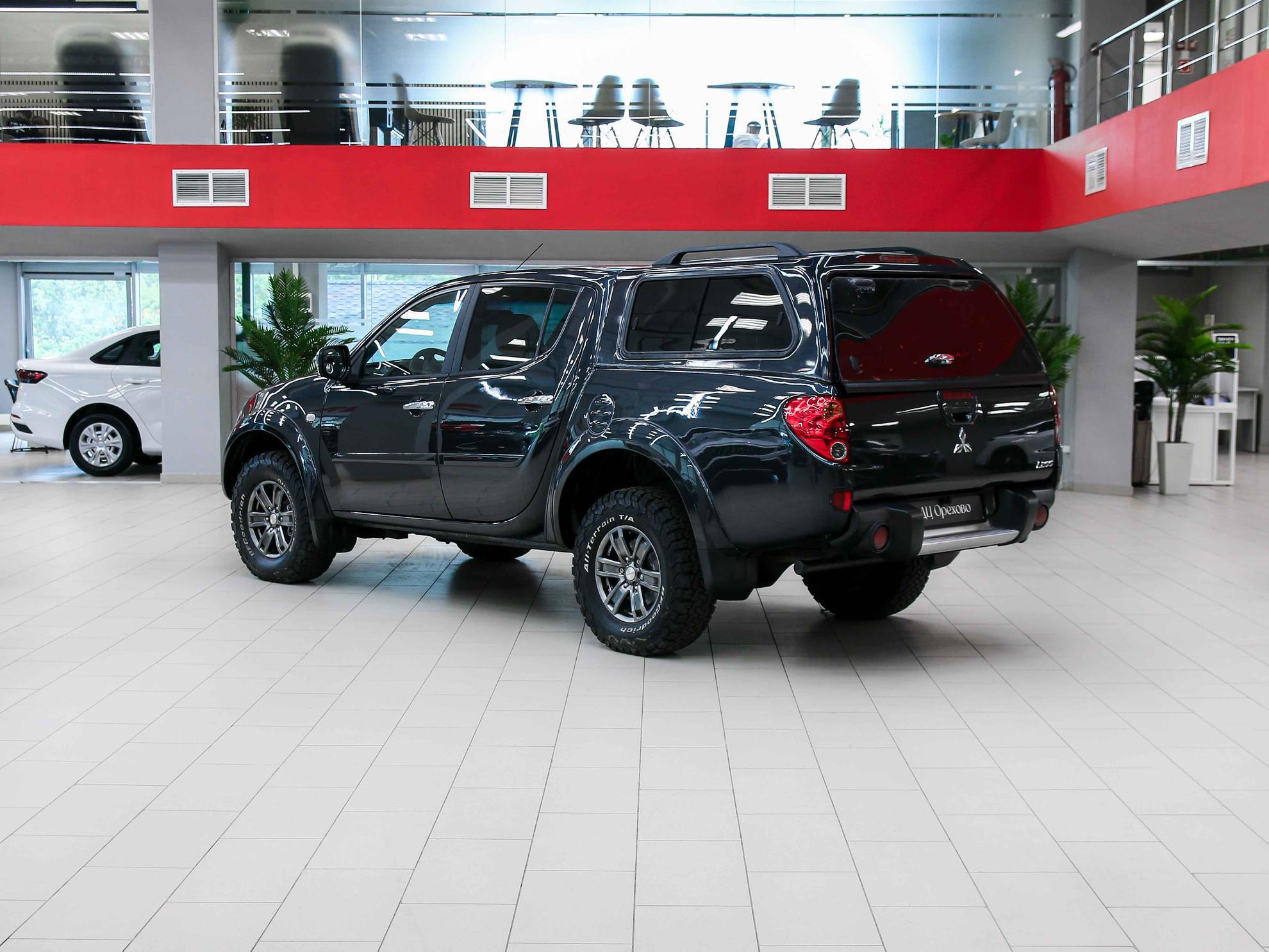 Mitsubishi L200 2011, черный, ДЦ Орехово