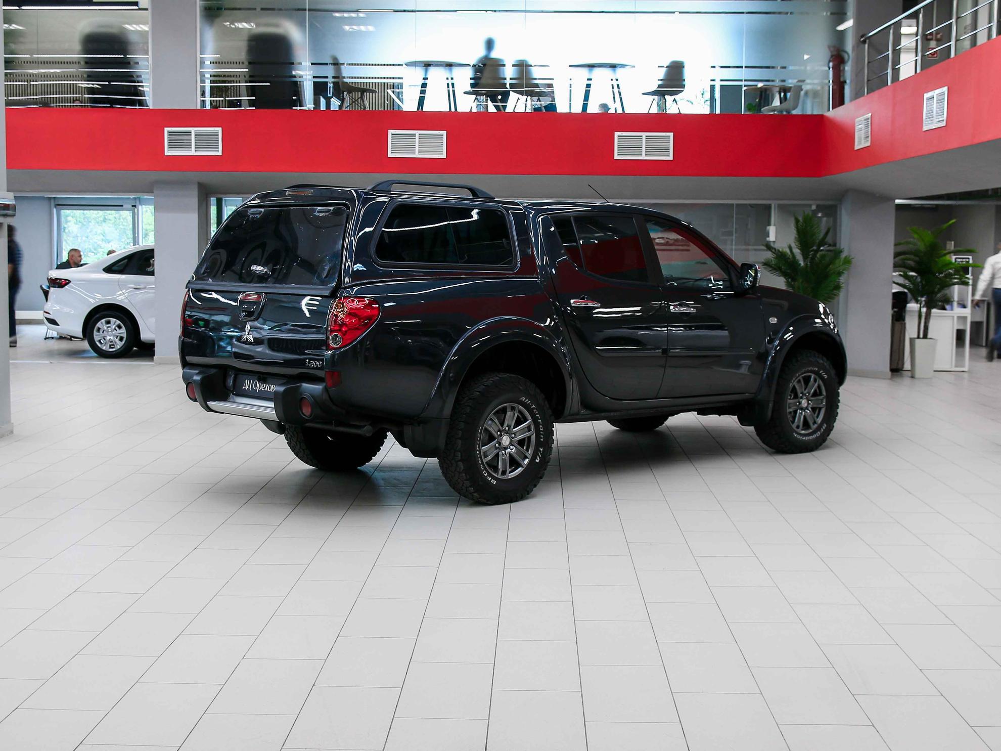 Mitsubishi L200 2011, черный, ДЦ Орехово