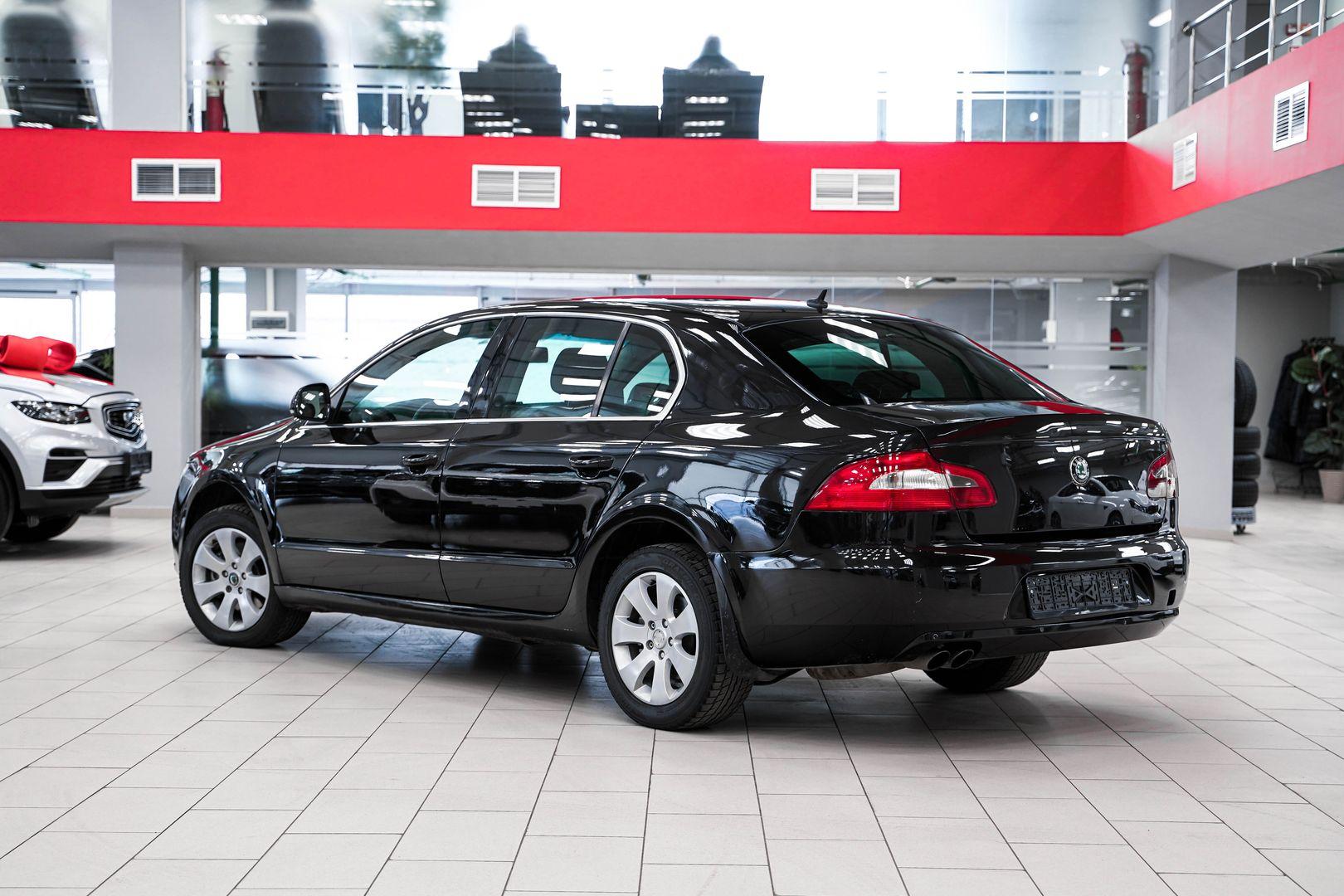 Skoda Superb 2010, черный, ДЦ Орехово