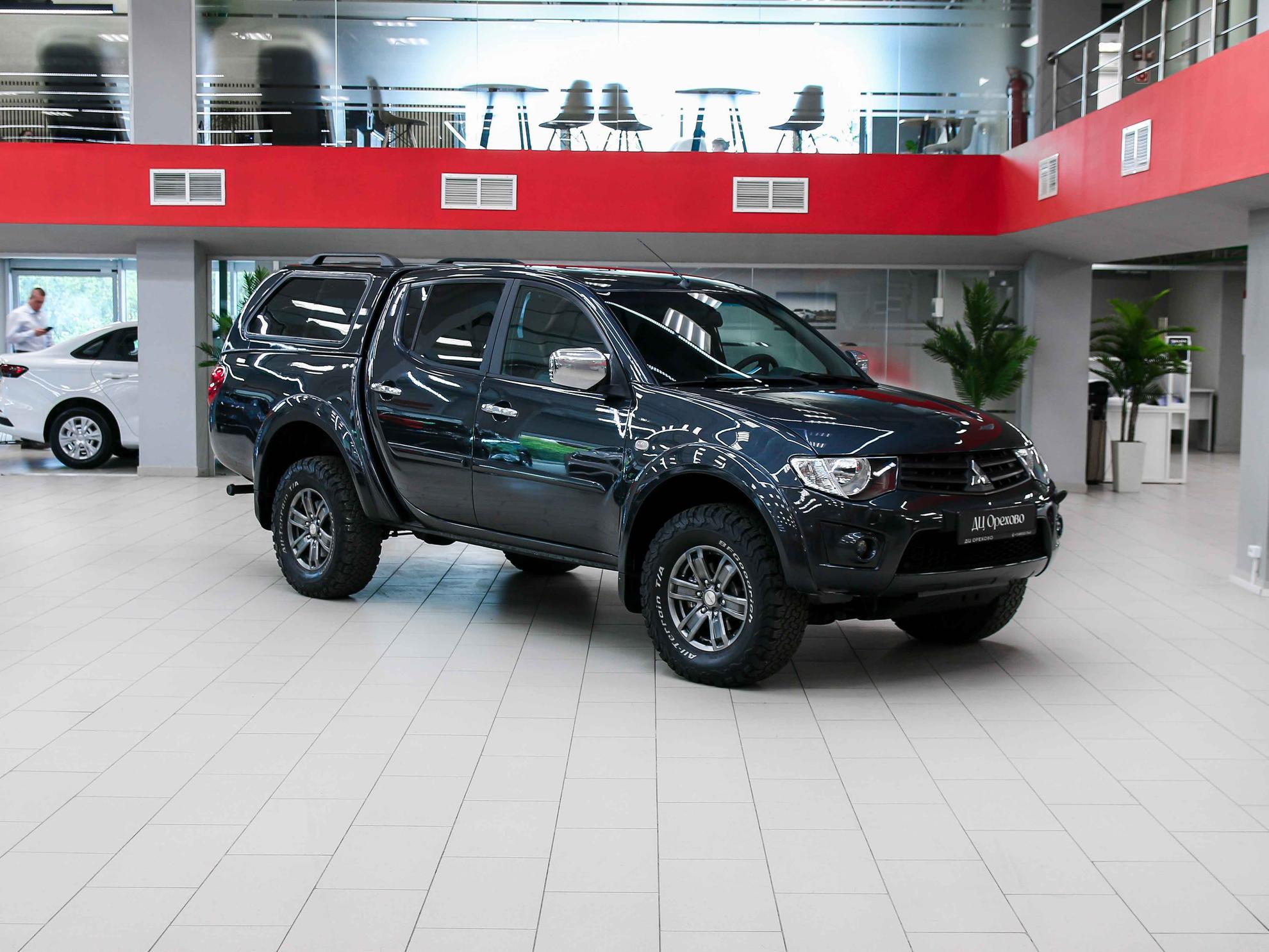 Mitsubishi L200 2011, черный, ДЦ Орехово